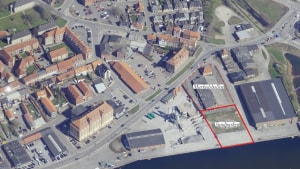 Den sydlige del af Nykøbing F. havn er første fase i en gennemgående helhedsplan, og fra 2025 vil havnen ikke længere have status af erhvervshavn. Luftfoto: havneudviklingskontoret, Guldborgsund Kommune